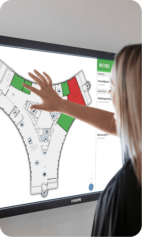 Booking a meeting room on a Meetio View touchscreen with floor plan map